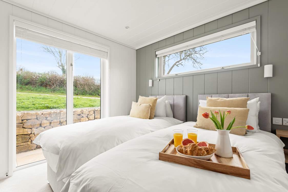 Gorgeous bedroom one has the luxury of a 'zip and link' bed so you can choose either twin beds or a super-king double.