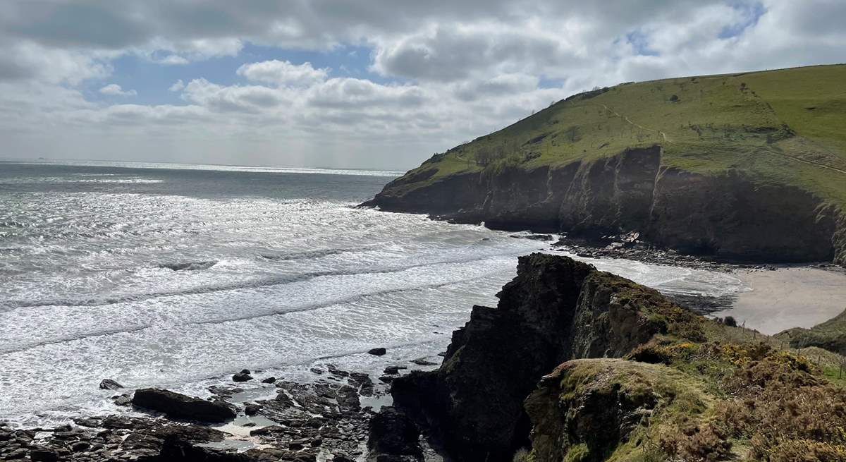 You can wander down to the magical beach of Mansands via the coastal path.