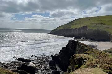 You can wander down to the magical beach of Mansands via the coastal path.