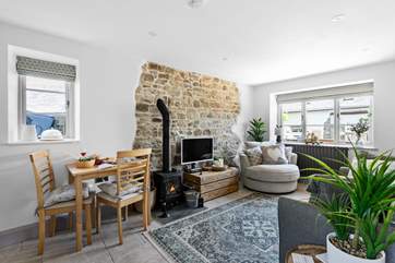 The open plan living space is wonderfully furnished.
