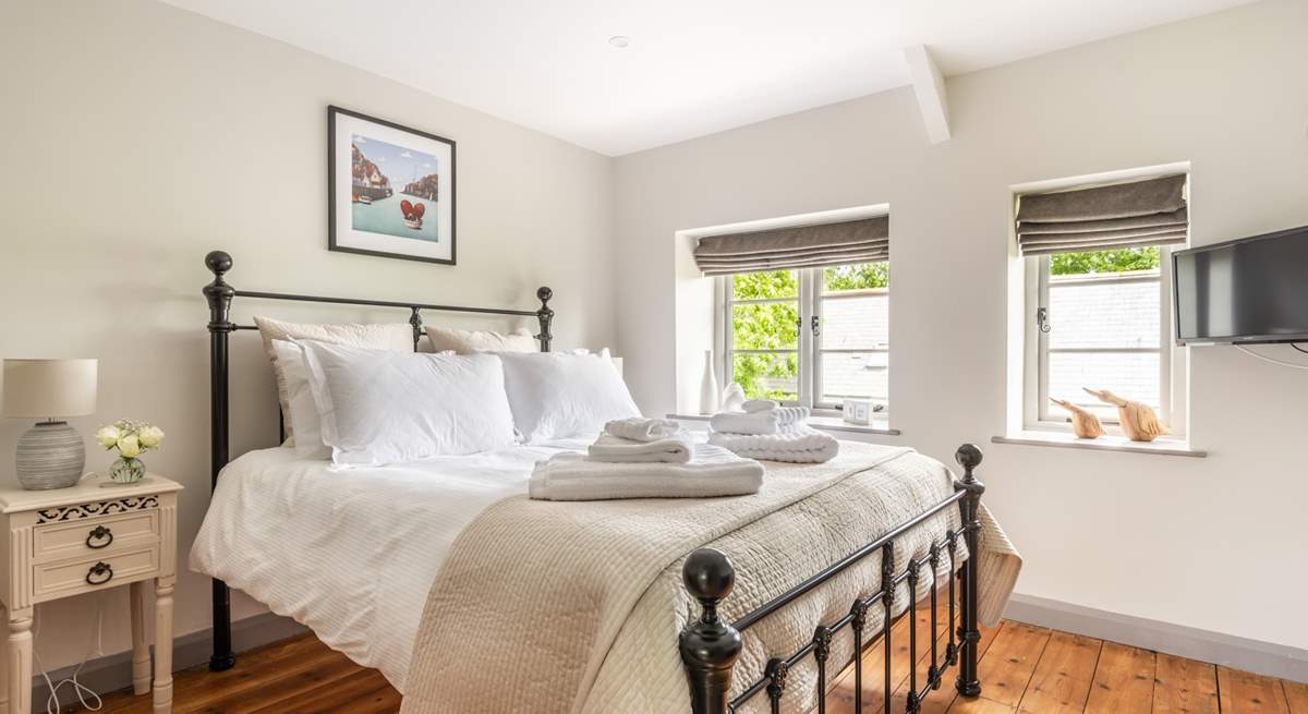 Sink into the gorgeous king-size bed.