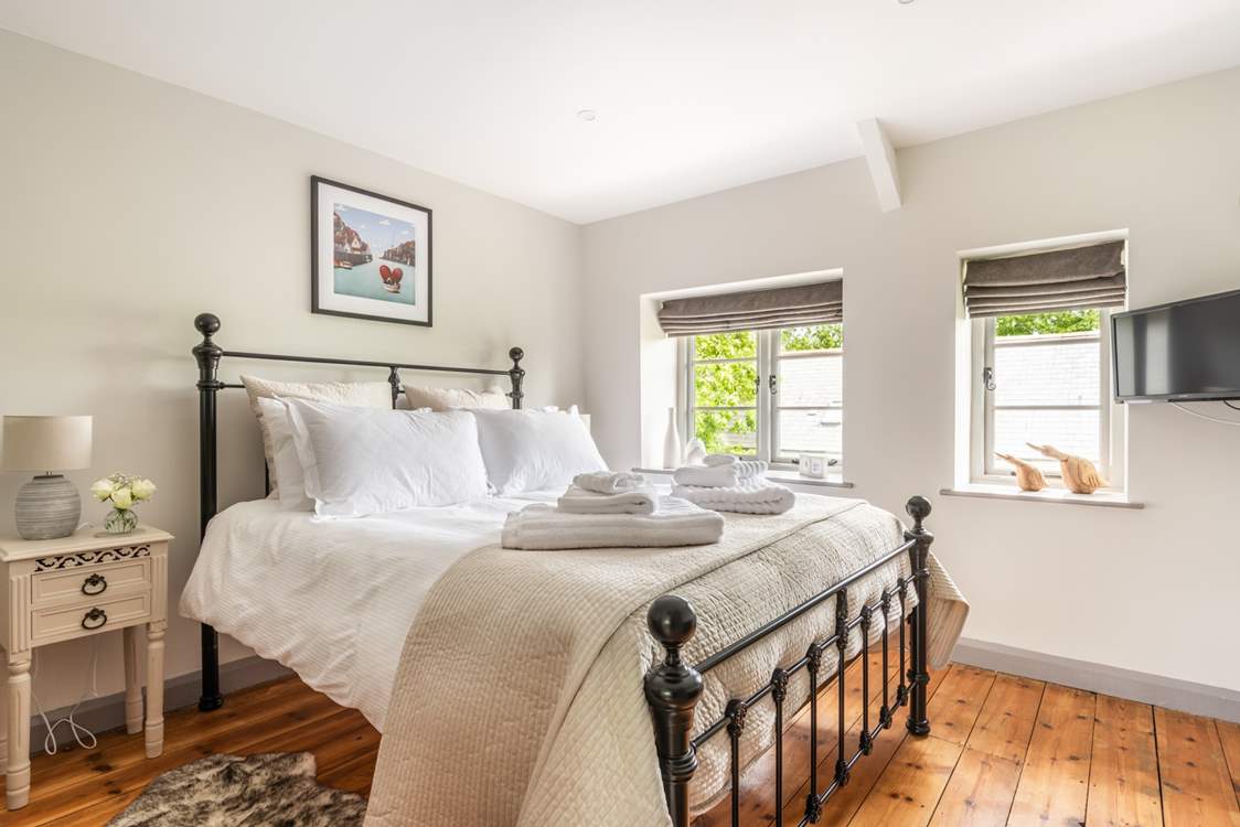 Sink into the gorgeous king-size bed.