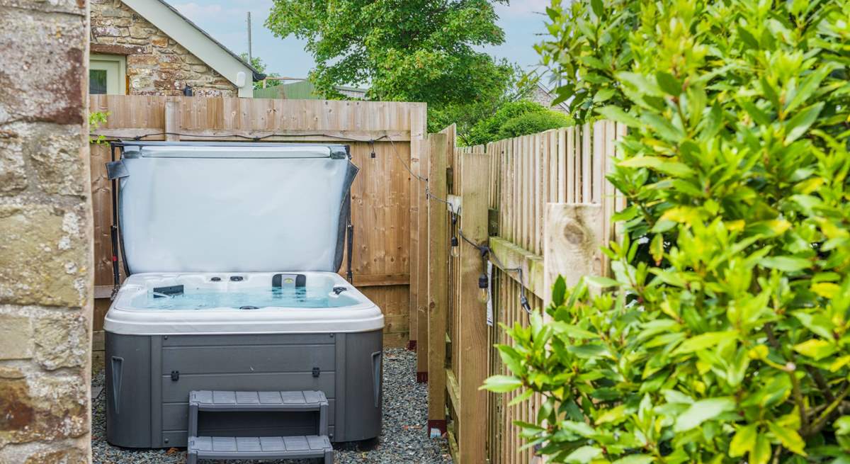 Enjoy relaxing in the bubbling hot tub.