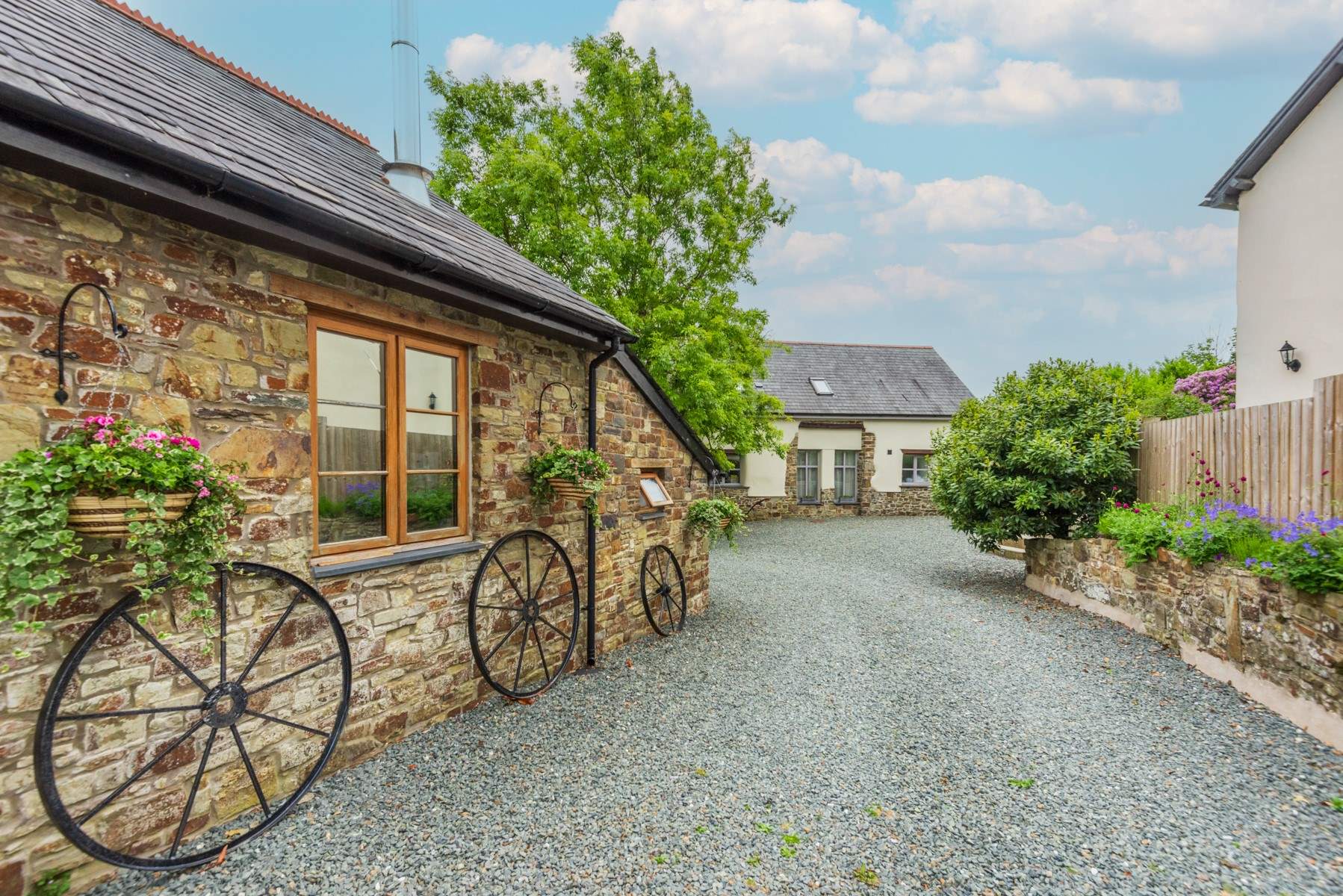 The entrance to Great Eckworthy. The Cottage can be seen on the right.