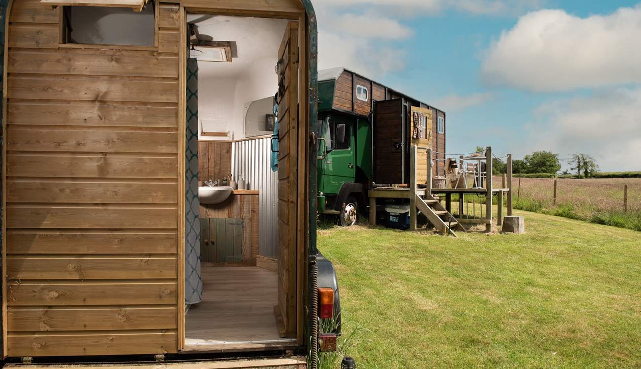 The shower-room is just foot steps away from the lorry. 