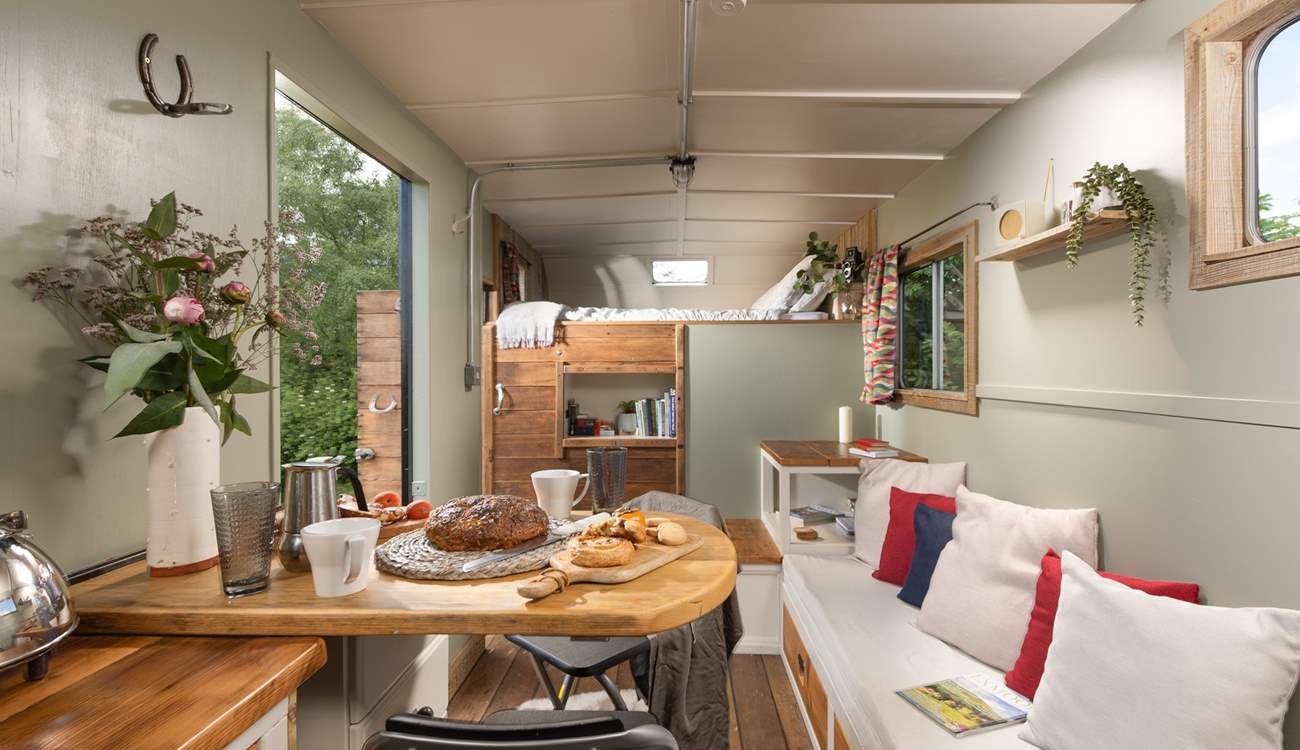 Pull up a seat at the clever drop-down table and tuck into some delicious local treats. 