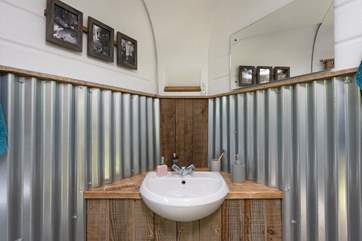 Upcycled and handcrafted features also run throughout the shower-room.