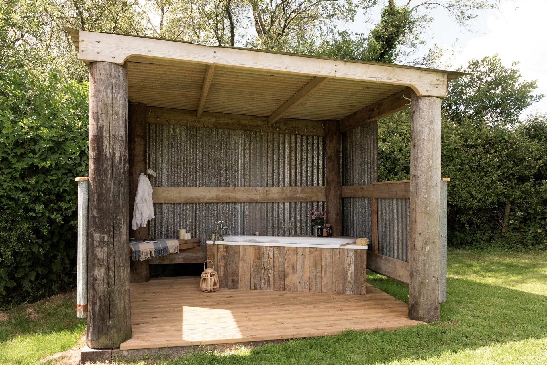 Complete with a beautiful outdoor bath tub to soak your cares away.