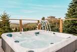 Admire far reaching views of the Devonshire countryside from the dreamy hot tub.