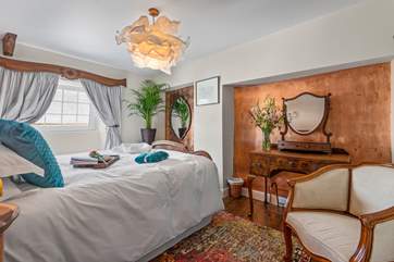 There are three opulent bedrooms to discover upstairs.