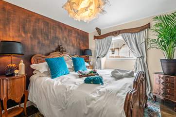 The luxurious theme is continued in the bedrooms.