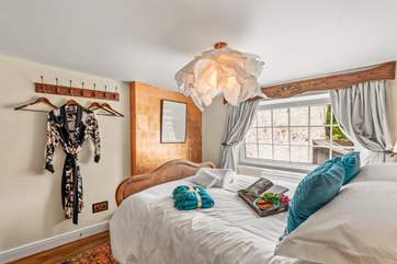 Natural light floods in through the tremendous window.