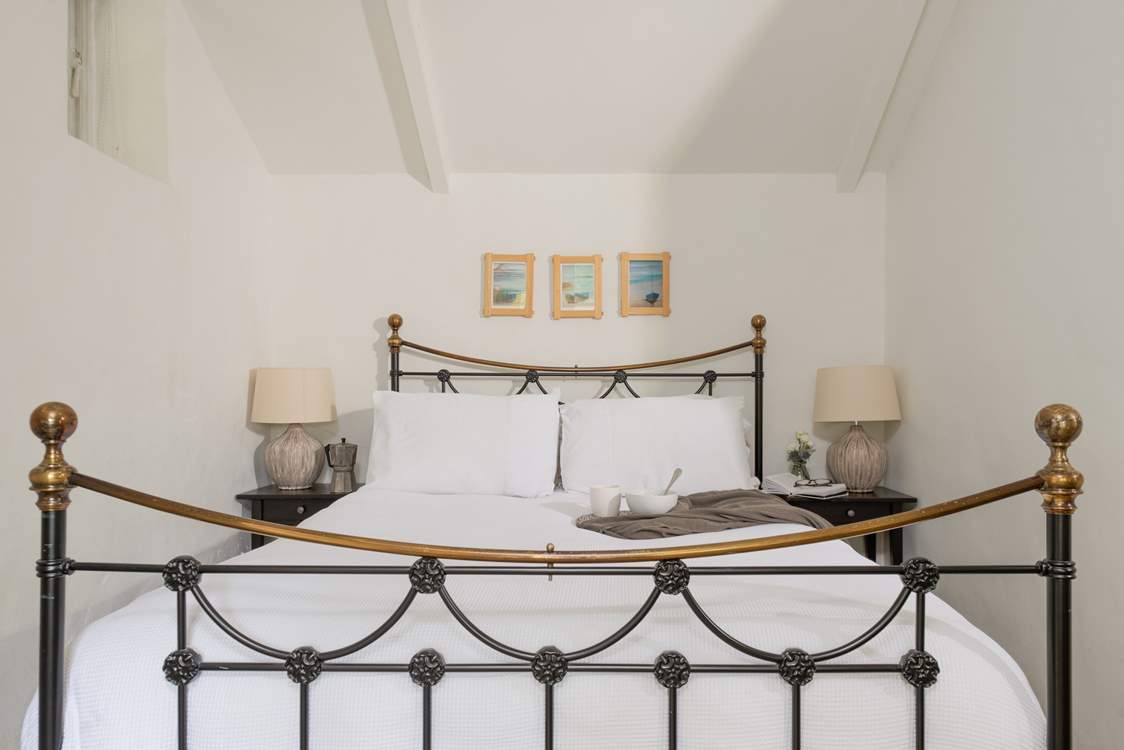 Bedroom 1 is a cute and cosy king-size room.