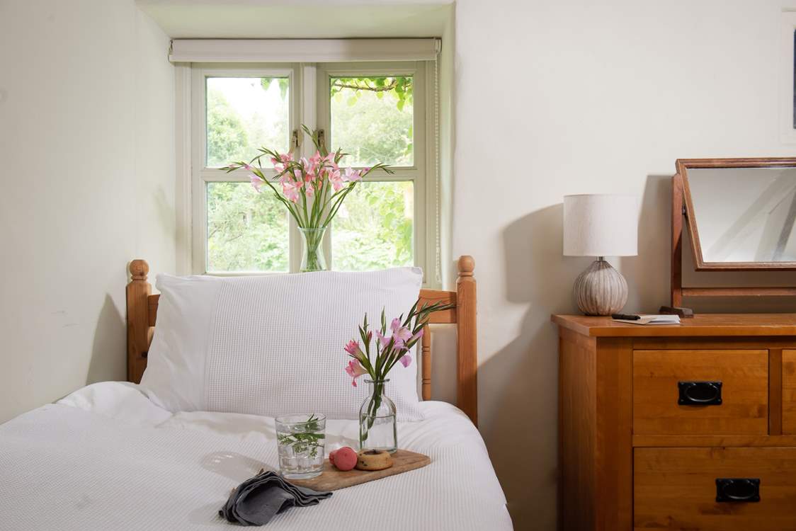 Sink into the comfortable bed after a day of exploring.