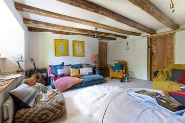 There are plenty of snug places to relax in the charming sitting-room.
