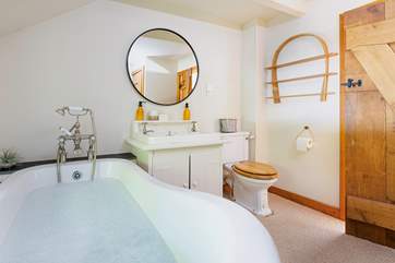 Relax in the indulgent free-standing bath in the main bathroom.