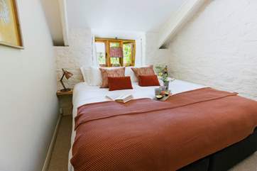The beautifully weathered walls of bedroom three give it a wonderfully snug feel