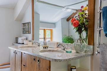 Freshen yourself up at the luxurious sinks before enjoying an invigorating shower from the rainfall shower.