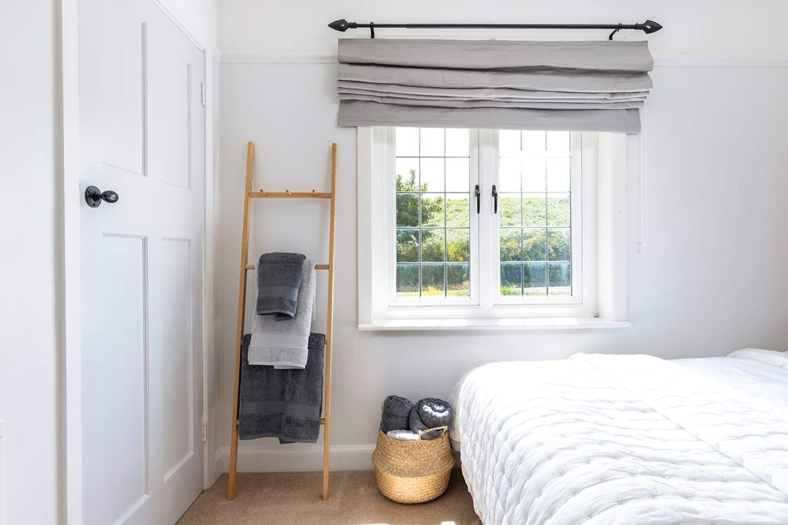 Gorgeous furnishings in muted colours.