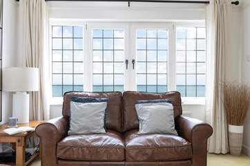 The sitting-room is beautifully furnished for a cosy evening in and of course the ever changing picture outside will always delight.