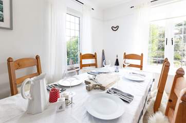 Gather everyone around the dining-table to chat about the day's adventures.