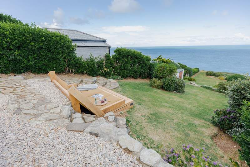 This gorgeous chair has been built into the side of the garden to make the most of the view.