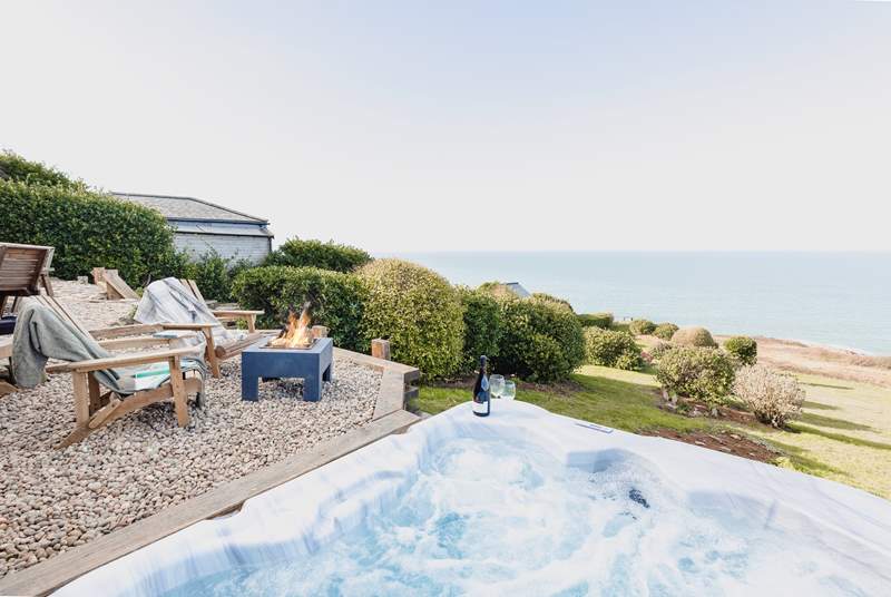 Relax in the hot tub and drink in the stunning views!