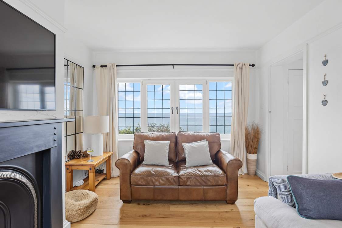 The sitting-room is beautifully furnished for a cosy evening in and of course the ever changing picture outside will always delight.