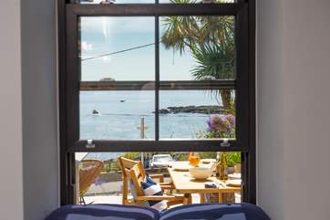 The little snug room, sit and watch the boats bob by.