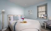 Bedroom 2 is a lovely room decorated in calming, coastal tones. - Thumbnail Image