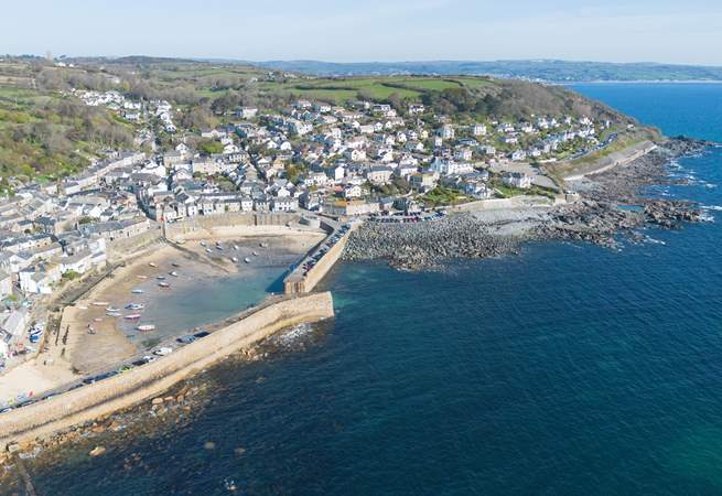 An aerial view of the charming village of Mousehole, No 1 Polvellan is less than a minutes walk to the beach.