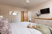 Bedroom 4 has an en suite.