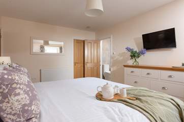 Bedroom 4 has an en suite.