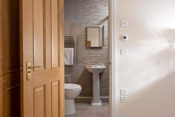 Bedroom 4's en suite shower-room.