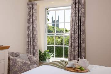 Breakfast in bed and enjoying the countryside views.