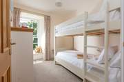 Bedroom 5 has cute bunk-beds, perfect for the children.