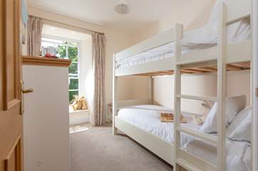 Bedroom 5 has cute bunk-beds.