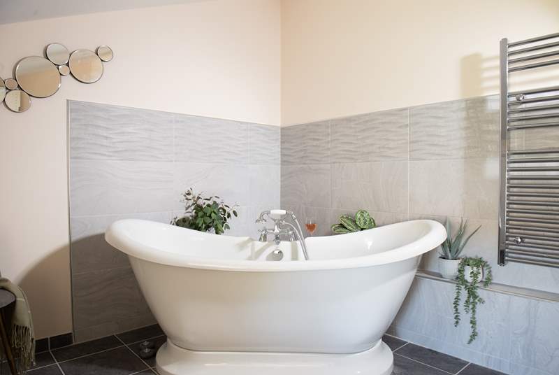 Sink into the gorgeous bath tub in the family bathroom.
