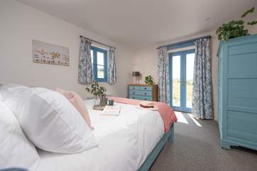 The dreamy bedrooms are decorated in relaxing tones.