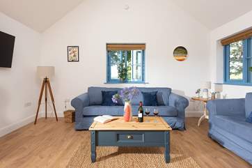 The open plan living space is light and bright with oodles of space for everyone.