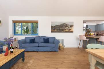 Sit and relax on the comfy sofa and watch a movie on the Smart TV after a busy beach day.