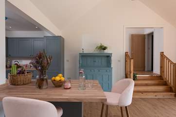 The small flight of steps lead from the living area to the bedrooms.