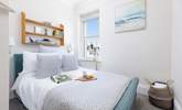 Bedroom 2 has a luxurious double bed, perfect for a great night's sleep yet positioned to take in the wonderful estuary view each morning. - Thumbnail Image