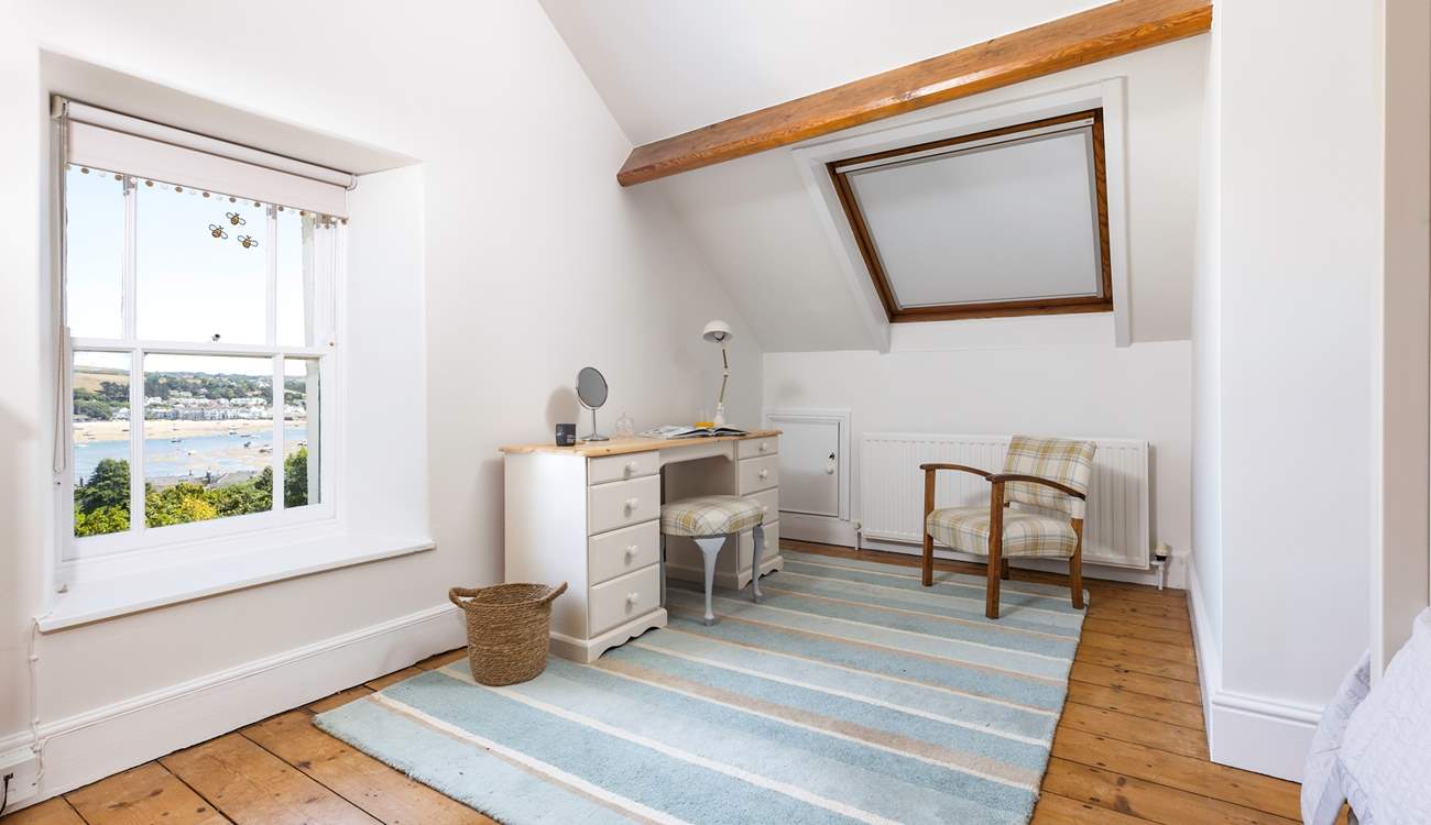 Pretty as a picture, the view is gorgeous from bedroom 4. Please take care around the sloping ceiling.