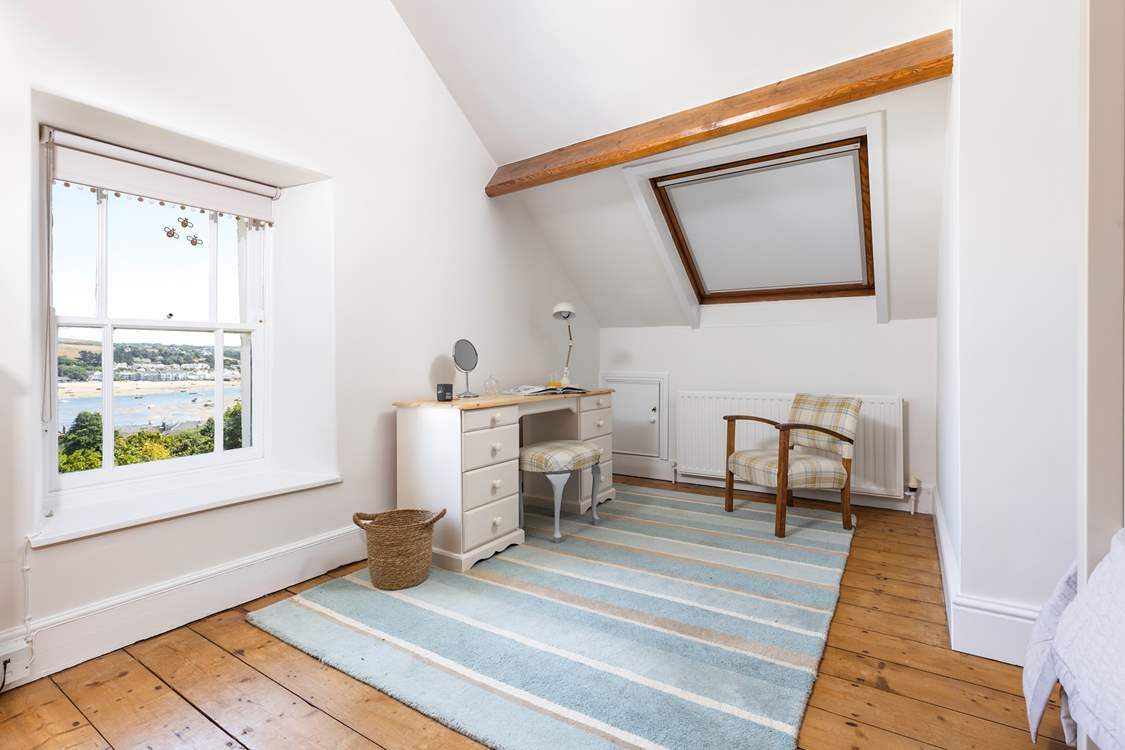 Pretty as a picture, the view is gorgeous from bedroom 4. Please take care around the sloping ceiling.