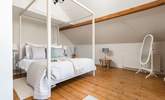 Gorgeous bedroom 4 is simply stunning, with a king-size double bed, en suite bathroom and gorgeous views towards the sea estuary. - Thumbnail Image