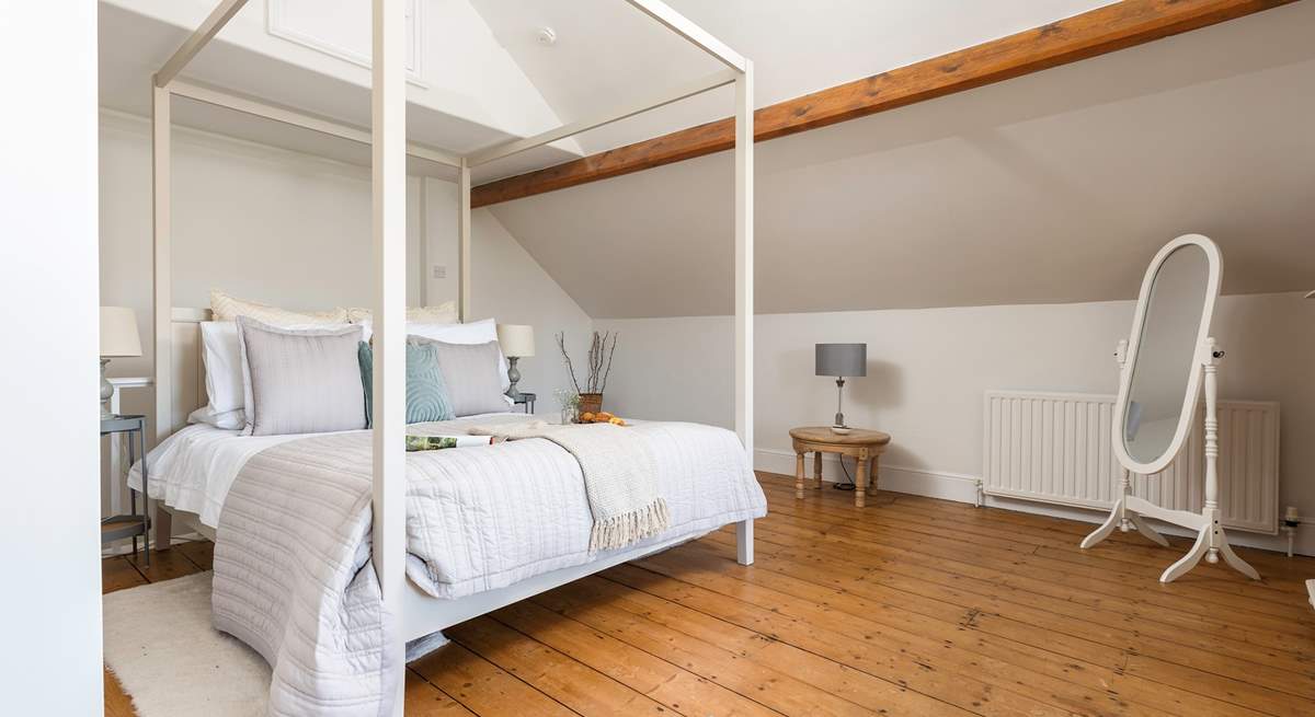 Gorgeous bedroom 4 is simply stunning, with a king-size double bed, en suite bathroom and gorgeous views towards the sea estuary.