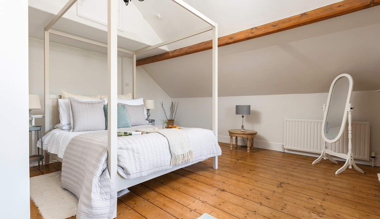 Gorgeous bedroom 4 is simply stunning, with a king-size double bed, en suite bathroom and gorgeous views towards the estuary.