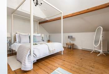 Gorgeous bedroom 4 is simply stunning, with a king-size double bed, en suite bathroom and gorgeous views towards the sea estuary.