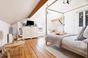 Charming bedroom 4 is the perfect place to relax. Please take care of the sloping ceiling.